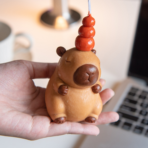 Capybara Candle – whimsical animal-shaped candle styled in warm ambience, perfect gift for animal enthusiasts