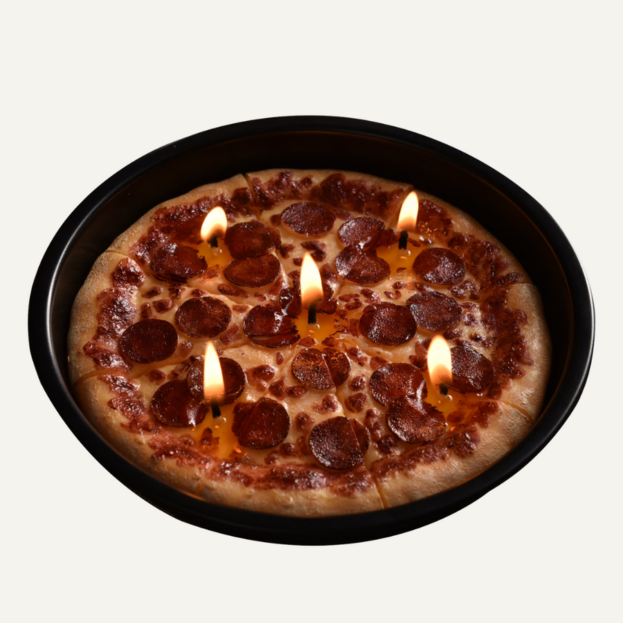 The Pizza Candle lighted with white back ground.