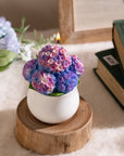 Experience the charm of indoor greenery with the realistic Hydrangea Candle from Southlake Gifts Canada