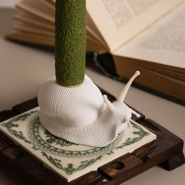 Quality craftsmanship: Experience the beauty and quality of handmade craftsmanship with the Moss Taper Candle and Snail Candle Holder Set. Created by Southlake Gifts Canada, this exquisite set features a taper candle with natural moss texture and an intricately designed snail candle holder, making it a unique addition to any home decor