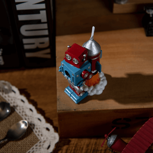 Adding a realistic Vintage Robot Rocket Candle from Southlake Gifts Canada to decorate any cake as the centrepiece, adding a touch of charm to the cake.