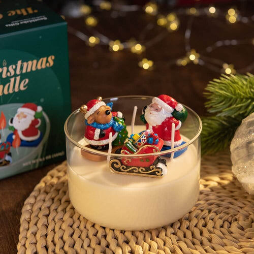The Christmas Candle with it's packaging displayed in a decor setting