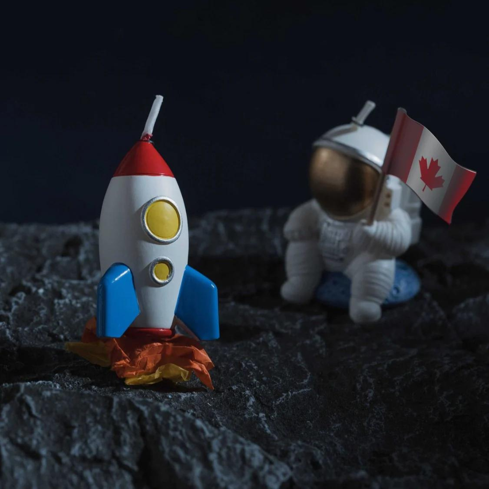 Landing Astronaut Candle and Rocket Candle from Southlake Gifts Canada foe you next space-themed party cake decor.