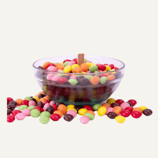 Colorful M&M Rainbow Chocolate Candle Bowl - Illuminate your space with this vibrant candle bowl featuring a delightful M&M rainbow design. Perfect for chocolate lovers. Available at Southlake Gifts Canada