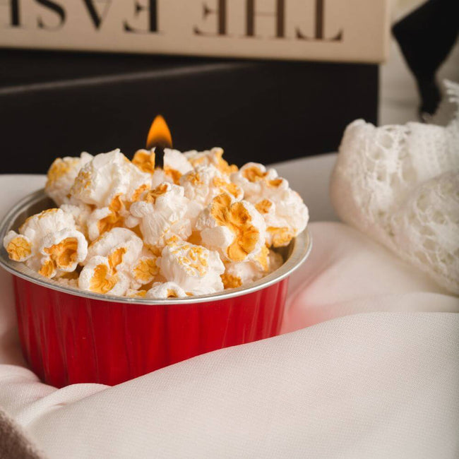 Popcorn Scented Candle - Treat yourself to a night in with the warm and comforting scent of popcorn. Available at Southlake Gifts Canada