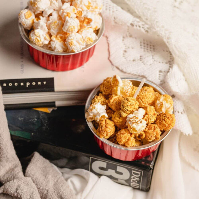 Caramel Popcorn Scented Candle - Treat yourself to a night in with the warm and comforting scent of caramel popcorn. Available at Southlake Gifts Canada