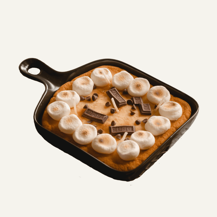 Chocolate and Marshmallow Skillet S&#39;more Candle - Indulge your senses with the enticing scent of chocolate and marshmallow in this realistic skillet candle from Southlake Gifts Canada