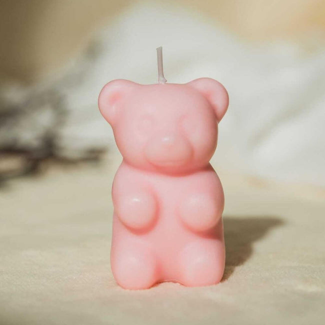 Gummy Bear Candle in pink - Perfect Gift Idea - Surprise someone special with this unique candle. Featuring three colors of gummy bears (white, blue, and pink) and a hidden surprise inside, it makes a perfect gift for candy lovers. Available at Southlake Gifts Canada