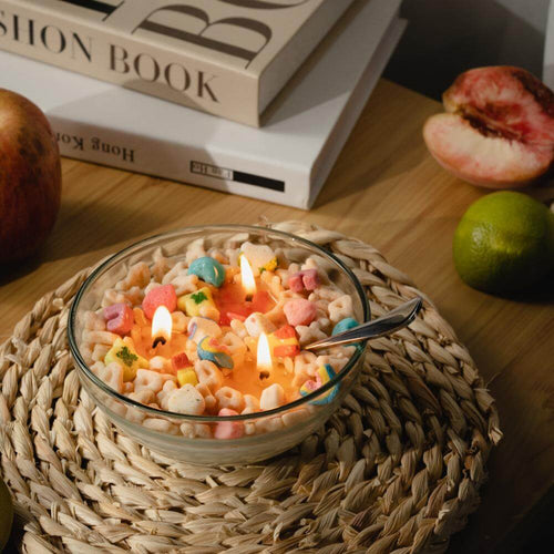 Southlake Gifts Canada presents the Lucky Charms Cereal Candle Bowl, offering both aesthetic appeal and comforting ambiance. This unique bowl is filled with marshmallow-shaped candles and creates a cozy atmosphere in any room.