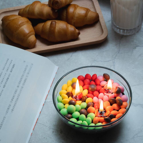 M&amp;M Rainbow Chocolate Scented Candle Bowl - Indulge your senses with this eye-catching candle bowl featuring a delightful M&amp;M rainbow design. The irresistible chocolate scent adds an extra layer of pleasure. Available at Southlake Gifts Canada