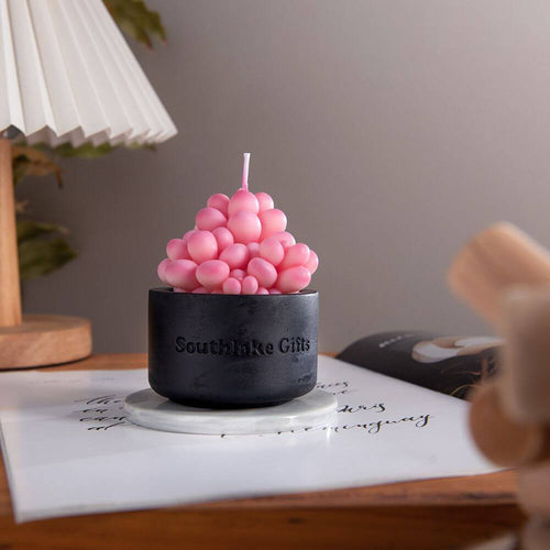 Unwind and relax with Southlake&#39;s Pink Moonstone Succulent Candle, boasting a captivating aroma of floral and earthy notes. Get yours today at Southlake Gifts Canada