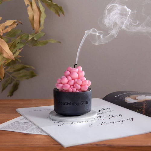 Southlake Gifts Canada proudly presents the Pink Moonstone Succulent Candle with Concrete Vessel from the Blooms &amp; Blossoms Candle Collection. Infuse your space with calming vibes and greenery while enjoying the exquisite craftsmanship of this unique succulent plant themed candle