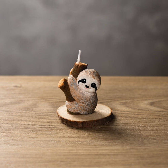 Bring the laid-back energy of nature’s most leisurely creature into your home with this beautifully made Baby Sloth Candle.