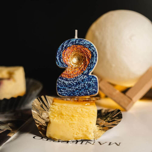 The number 2 Galaxy Space Number Candle from Southlake Gifts Canada and it can be added as a cake topper/decoration for your birthday cakes.