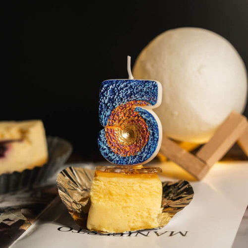 The number 5 Galaxy Space Number Candle from Southlake Gifts Canada and it can be added as a cake topper/decoration for your birthday cakes.