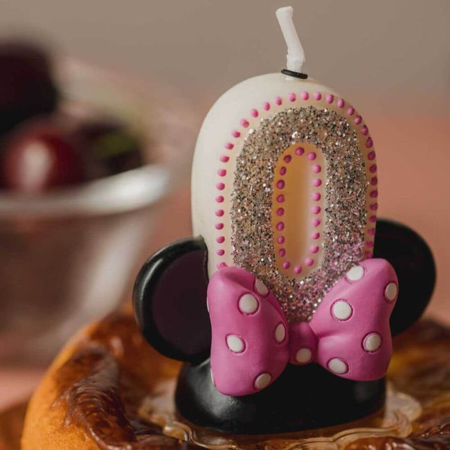 Handmade candle design with iconic ears, complete with a cute polka-dot bow.