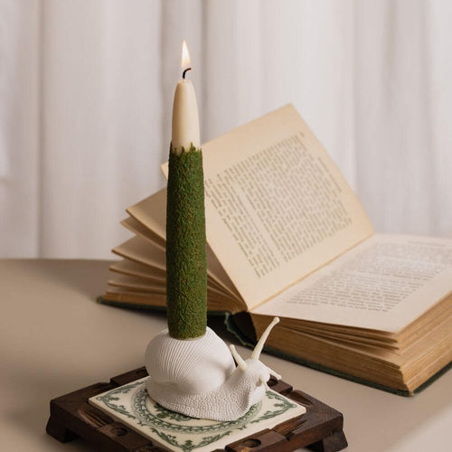A unique gift option: Give the gift of elegance with the Moss Taper Candle and Snail Candle Holder Set. Exclusively handmade by Southlake Gifts Canada, this set features a taper candle with natural moss texture and an intricately designed snail candle holder, making it a perfect gift for any occasion