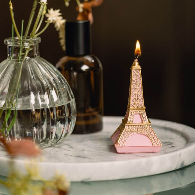 The Pink Eiffel Tower Candle that fills the room with a warm inviting glow—perfect for a romantic dinner from Southlake Gifts Canada.