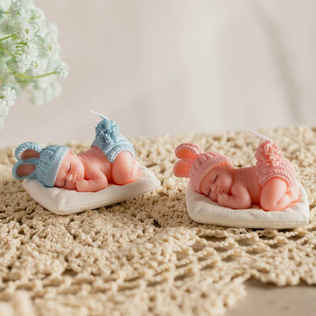 The Sleeping Baby Candles girl and boy to add a touch of sweetness to your home from Southlake Gifts Canada.