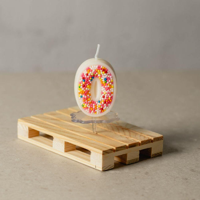 The number 0 Sprinkle Candy Number Candle from Southlake Gifts Canada to add as a cake topper for your celebration .